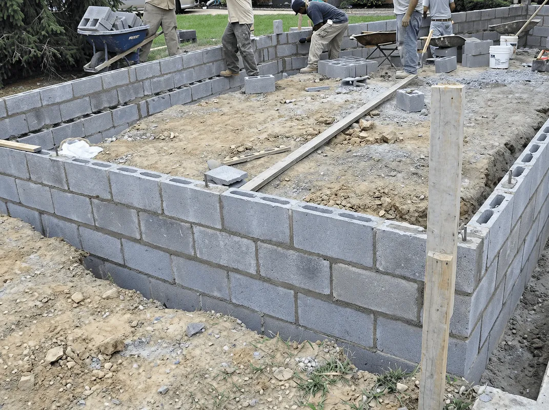 Professionals building a foundation with blocks in Dayton, OH